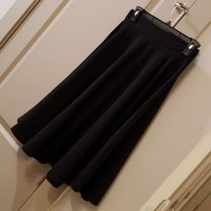SOLD Black pleated skirt